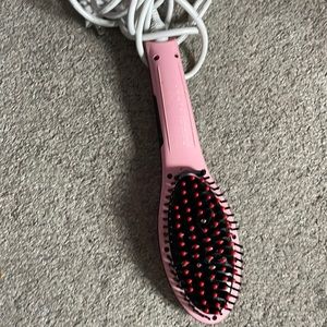 Pink,black and, red straightening brush